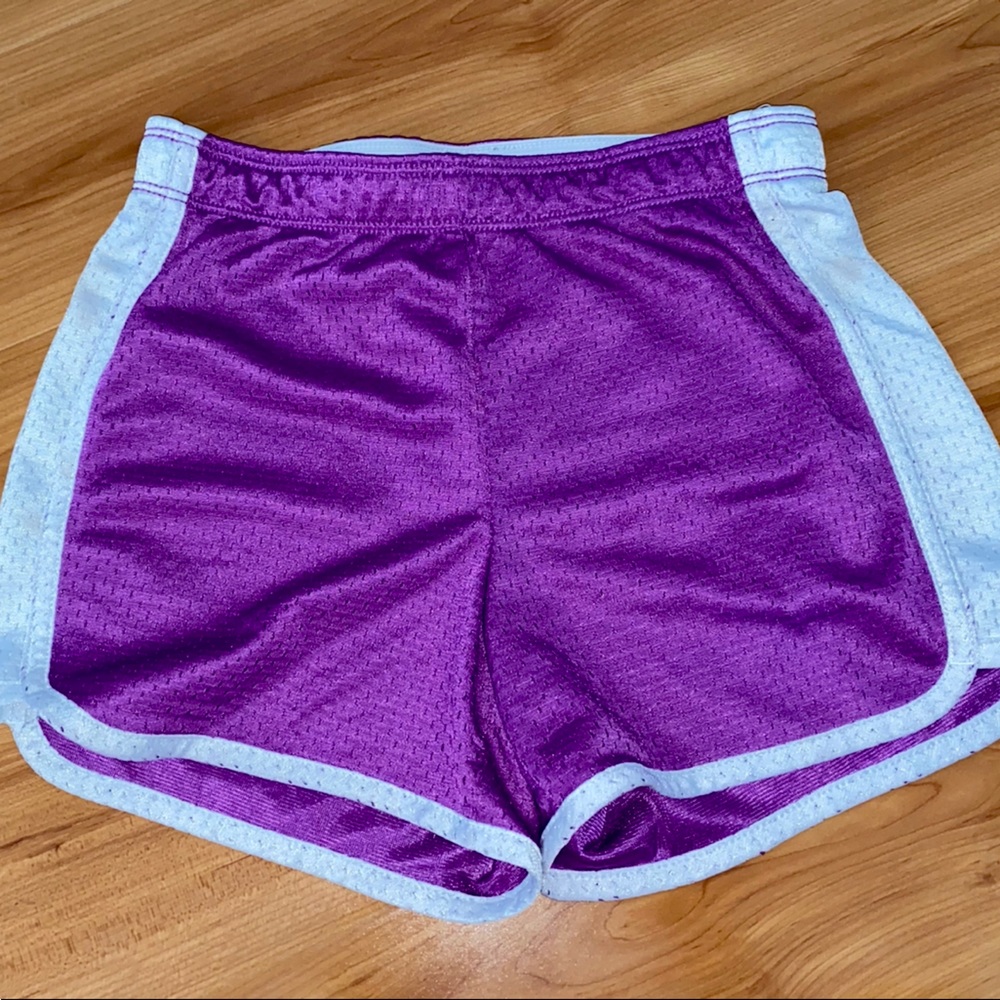 Justice active wear shorts , kids size 8 , blue and purple